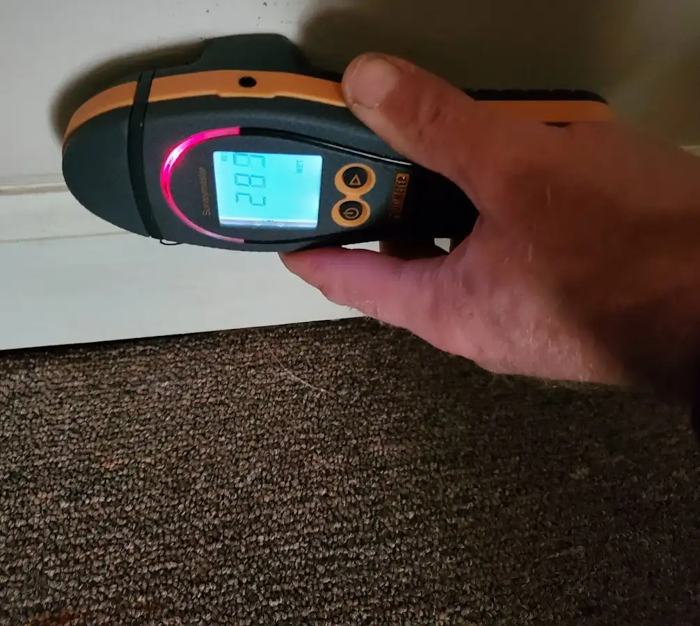 Moisture detection at baseboard during Sewage Cleanup & Sanitation in Alpharetta